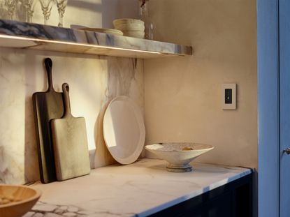 a smart light switch in a kitchen