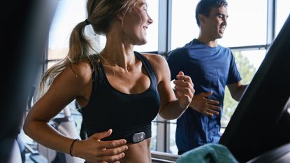Polar H9 heart rate sensor chest strap: woman wearing the Polar H9 during cardio workout