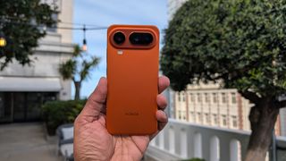 Back on the Honor Magic 8 Pro Air in orange in the hand