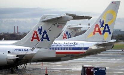 An American Airlines passenger on a recent flight mishap: "The seats flipped backwards... People were essentially on the laps of the people behind them with their legs up in the air."