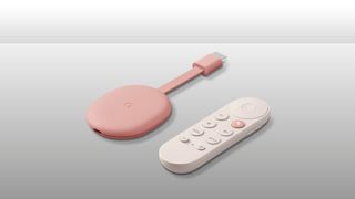 A pink Chromecast and remote control on a grey background