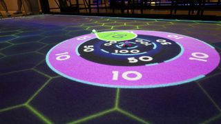 The Atomic Golf virtual putting green powered by Christie projectors. 