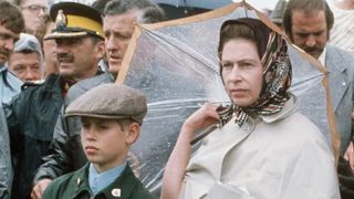 Queen Elizabeth II with Prince Edward watching Princess Anne compete in the Equestrian event at the 1976 Summer Olympics