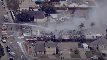 The site of a small plane crash in Santee, California.