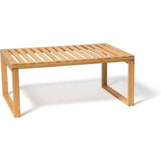 Slatted bamboo kitchen shelf riser. Its rectangular on square legs