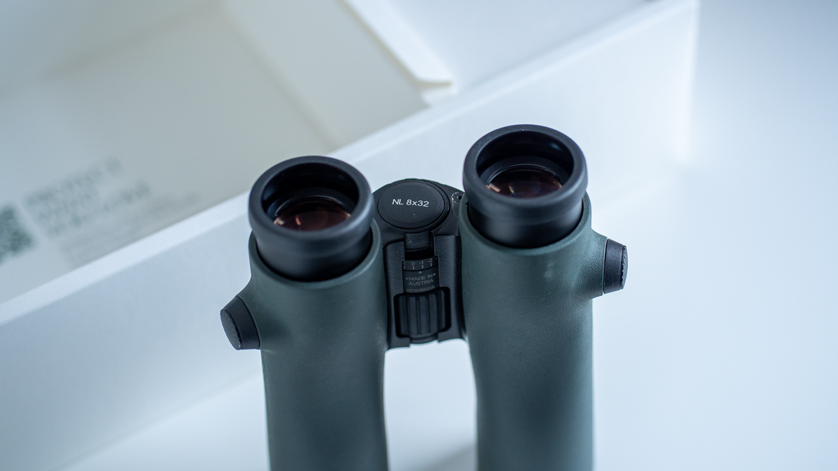 Swarovski NL Pure 8x32 binoculars on a white surface