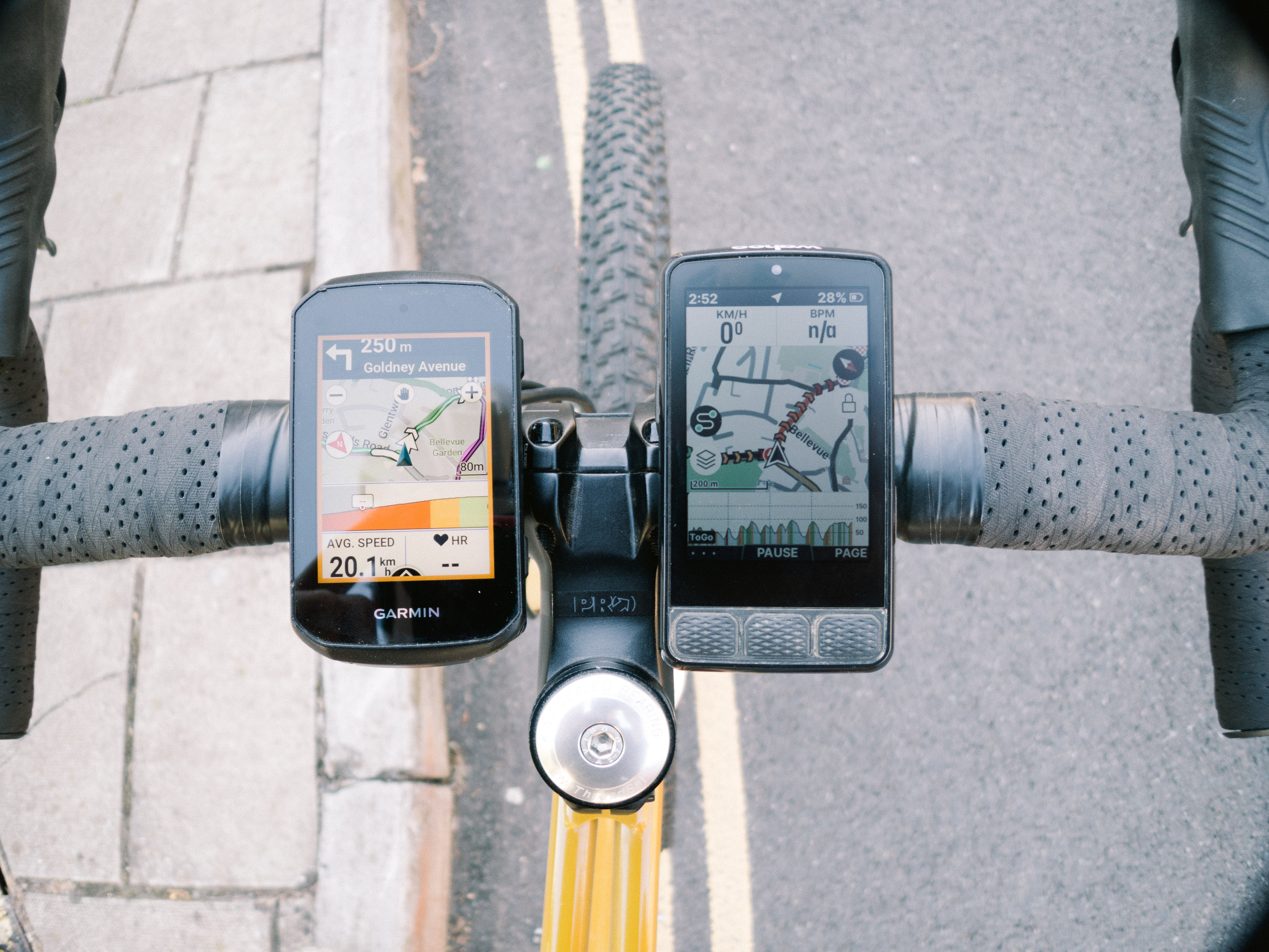 Two bike computers on the handlebar of a gravel bike