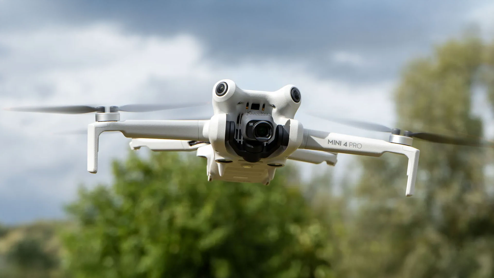 DJI Mini 4 Pro in flight, front on