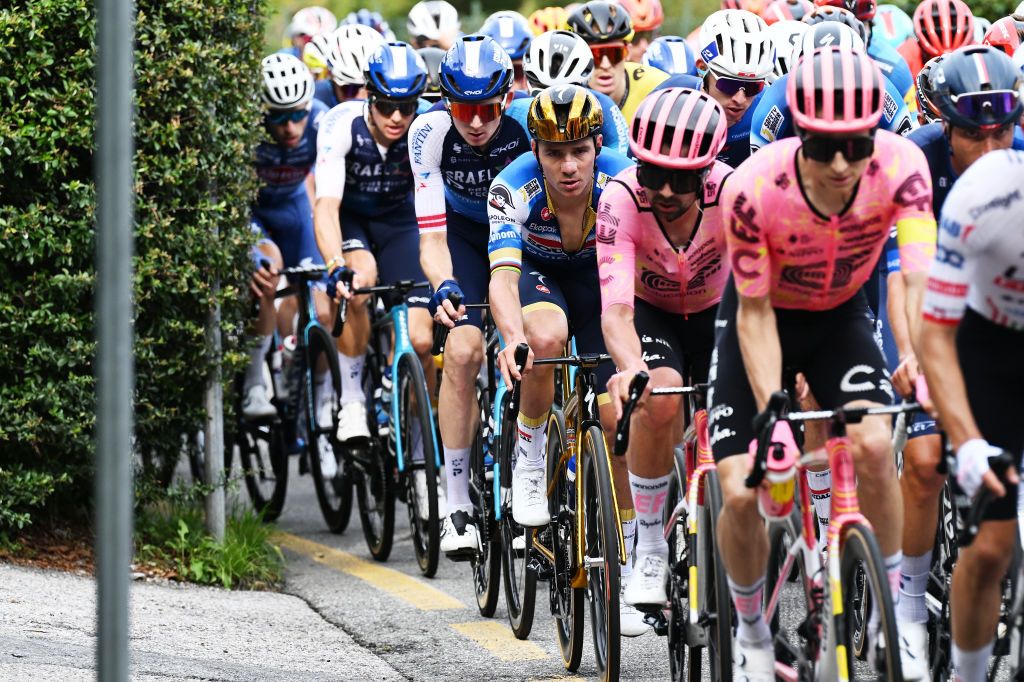 COMO ITALY OCTOBER 12 LR Krists Neilands of Latvia and Team Israel Premier Tech and Remco Evenepoel of Belgium and Team Soudal QuickStep compete during the 118th Il Lombardia 2024 a 255km one day race from Bergamo to Como UCIWT on October 12 2024 in Como Italy Photo by Tim de WaeleGetty Images