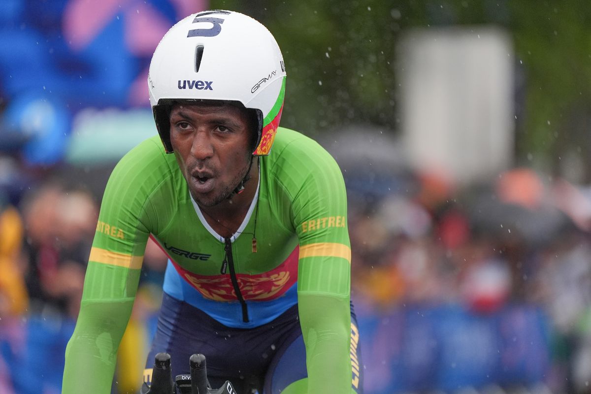 Binian Girmay flys the flag for Eritrea in the time trial