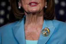 Nancy Pelosi wearing an American and Ukrainian flag pin