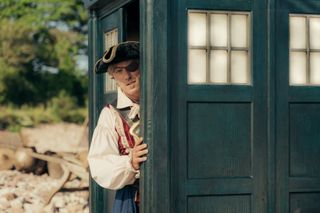Dan Lewis (John Bishop) steps out of the TARDIS dressed as a pirate.