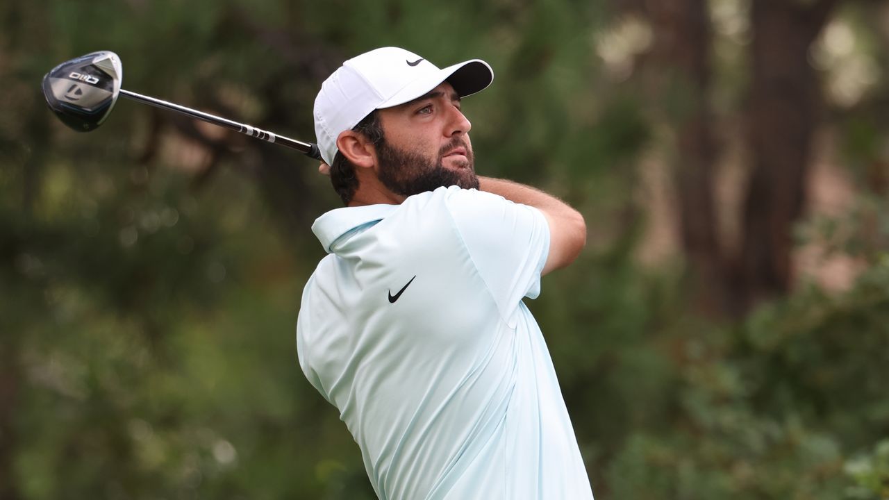 Scottie Scheffler takes a shot in the BMW Championship