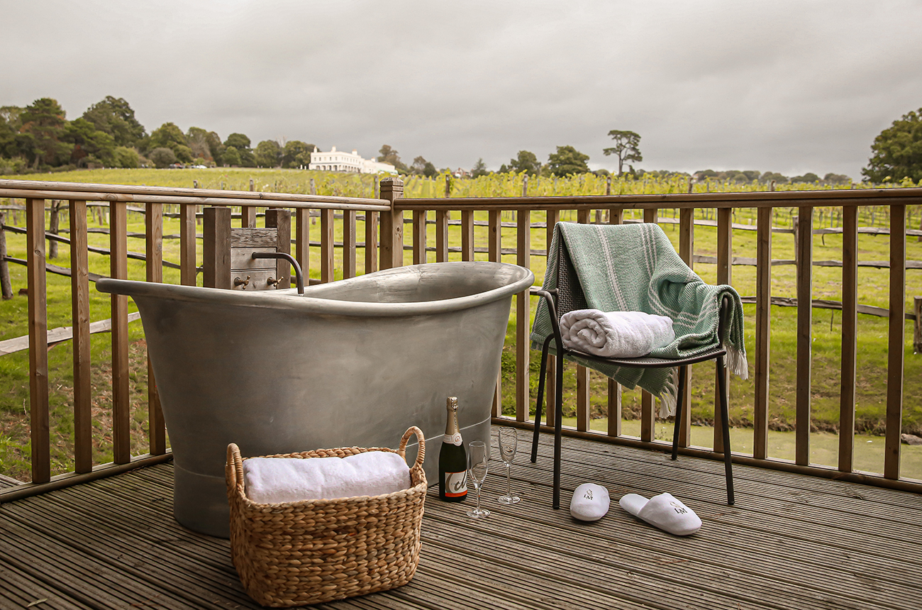 Outdoor bathtub outside a guest room at Lympstone Manor.