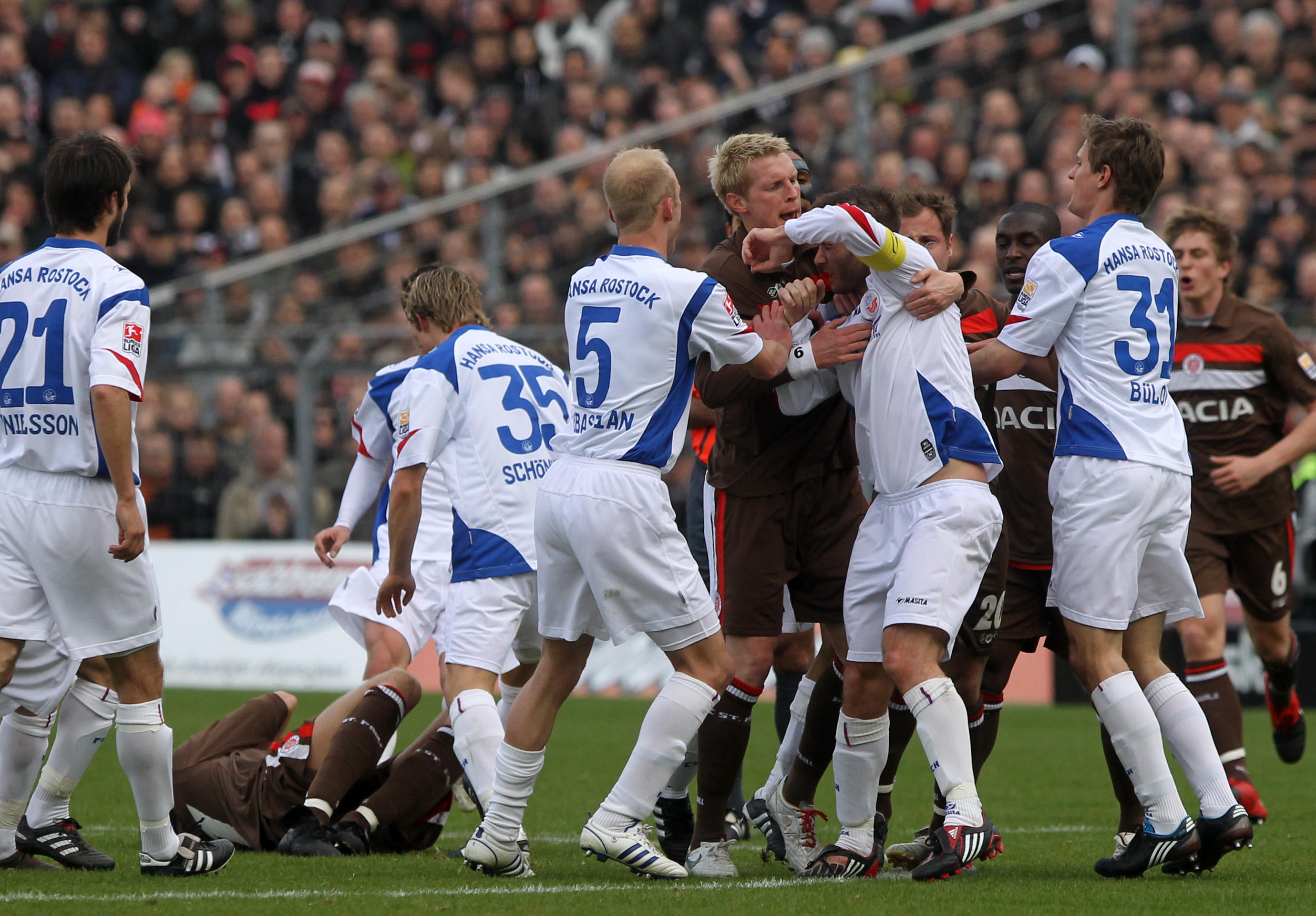 A scuffle between Hansa Rostock and St. Pauli players during a match in 2010