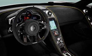 Interior view of steering wheel and dashboard
