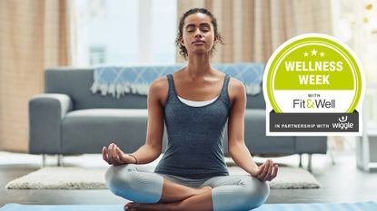 Woman meditating at home