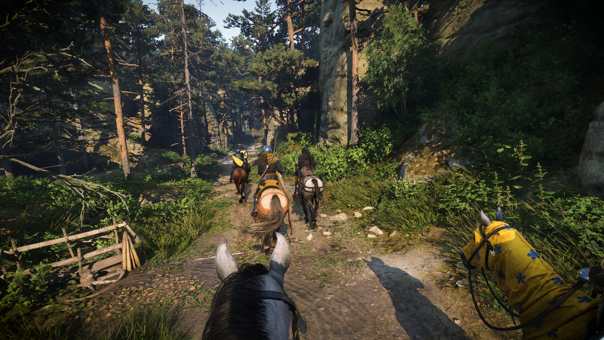 Kingdom Come Deliverance 2 screenshot featuring Henry riding on a horse in the woods