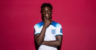 Bukayo Saka of England poses during the official FIFA World Cup Qatar 2022 portrait session on November 16, 2022 in Doha, Qatar.