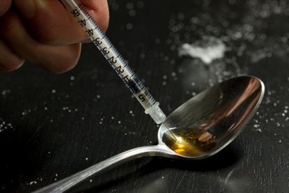 Police say a patient sold heroin from her Pennsylvania hospital room