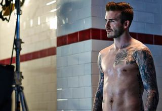 David Beckham strips off for new H&M Bodywear ads