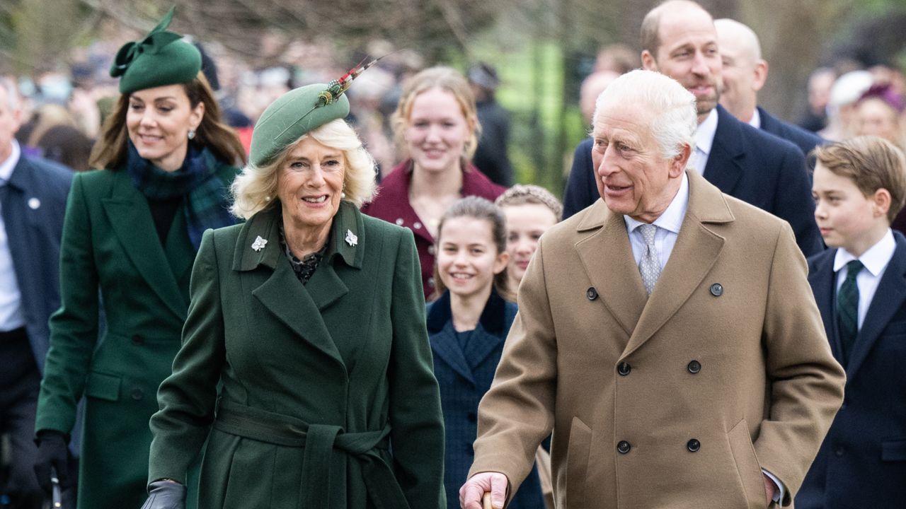 Kate Middleton, Queen Camilla and King Charles walking in wool coats on Christmas Day with Princess Charlotte, Prince William and Prince George behind them