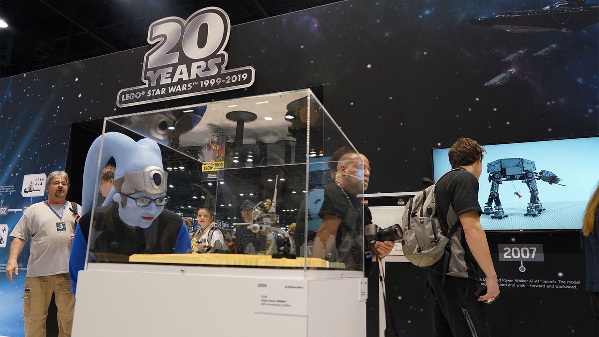 Star Wars fans explore the Lego Star Wars exhibit at Star Wars Celebration in Chicago.