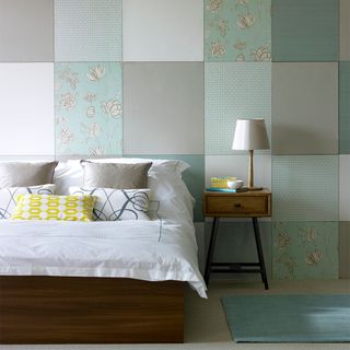 bedroom with wallpaper patchwork effect wall