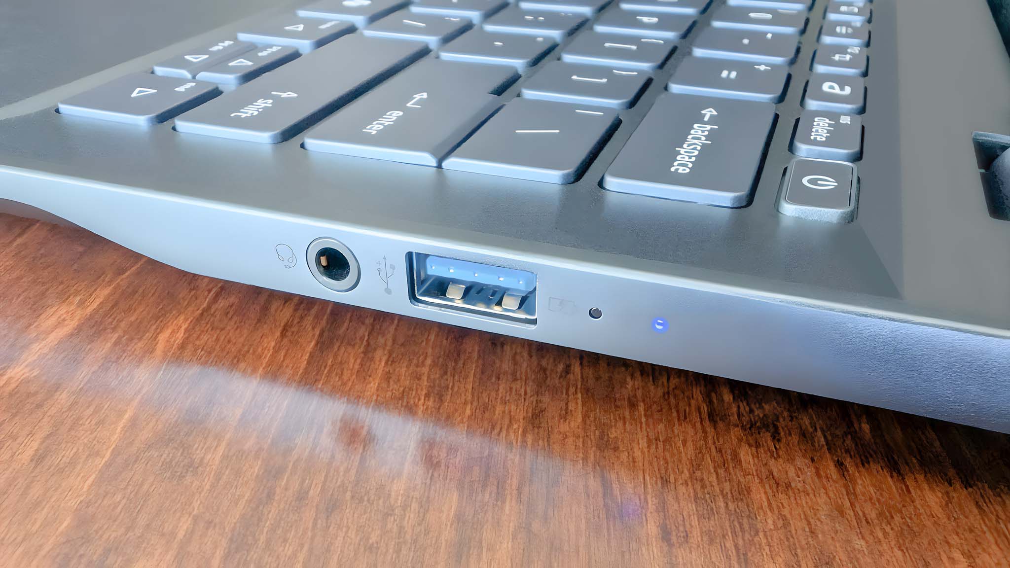 Closeup of Acer Swift 14 AI's left side headphone jack and USB-A port