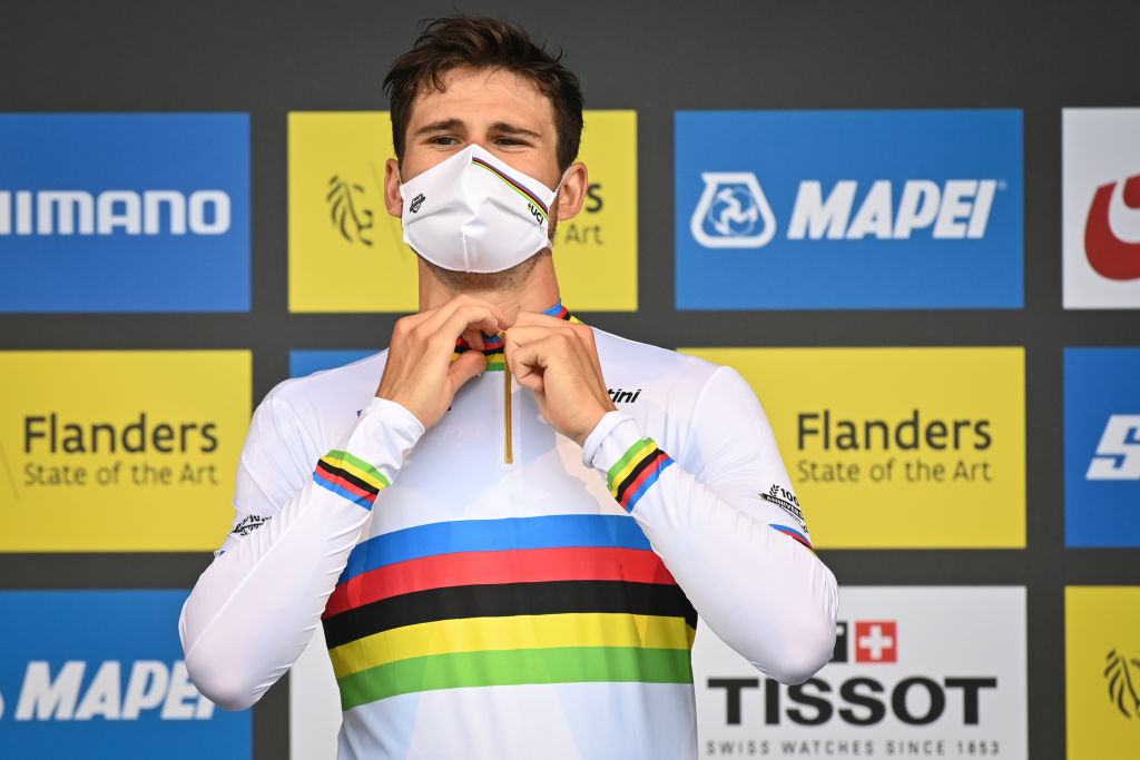 Italian Filippo Ganna of Ineos Grenadiers winner of the gold medal celebrates on the podium of the men elite time trial race 433 km from KnokkeHeist to Brugge at the UCI World Championships Road Cycling Flanders 2021 in Brugge on Sunday 19 September 2021 The Worlds take place from 19 to 26 September 2021 in several cities in Flanders Belgium BELGA PHOTO DAVID STOCKMAN Photo by DAVID STOCKMANBELGA MAGAFP via Getty Images
