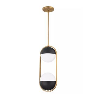 A pendant light with a brushed gold base and two white and black globes within a curved gold frame