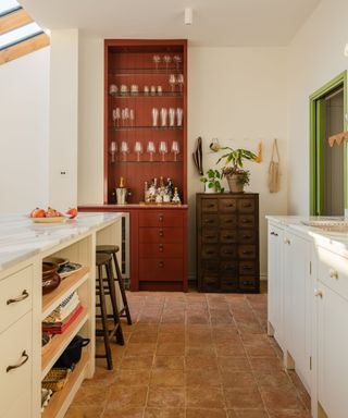 british standard cupboards white kitchen with red bar