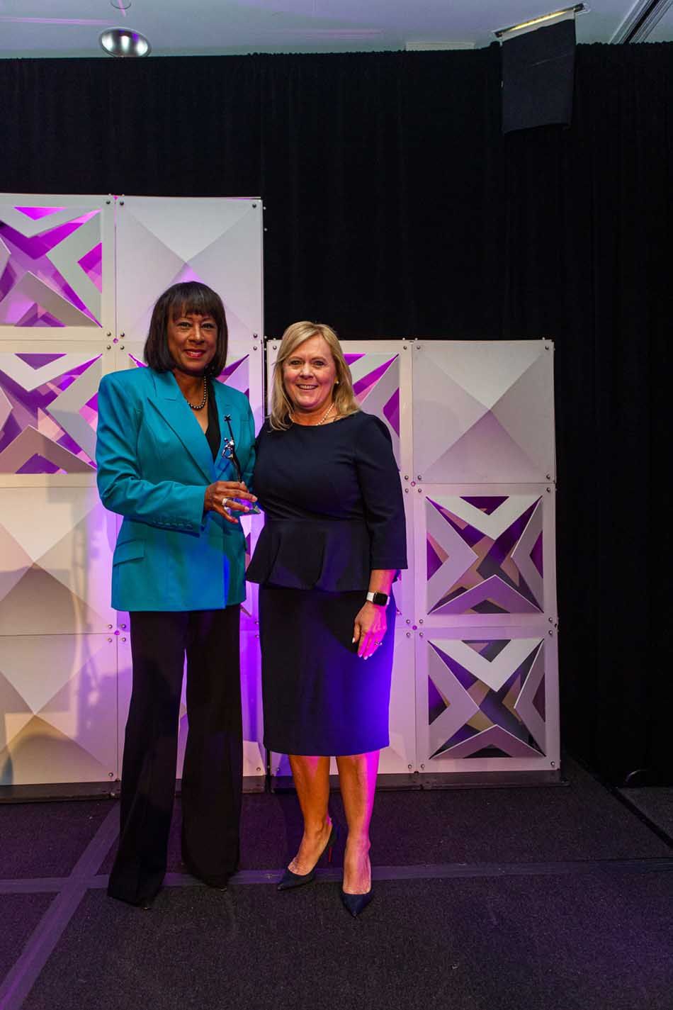 Co-host Pat Harvey of KCBS-KCAL Los Angeles with honoree Lisa Knutson, president, Scripps Networks.