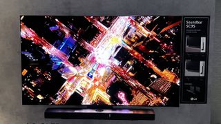 A picture of the LG C3 OLED displaying an aerial shot of a city at night.