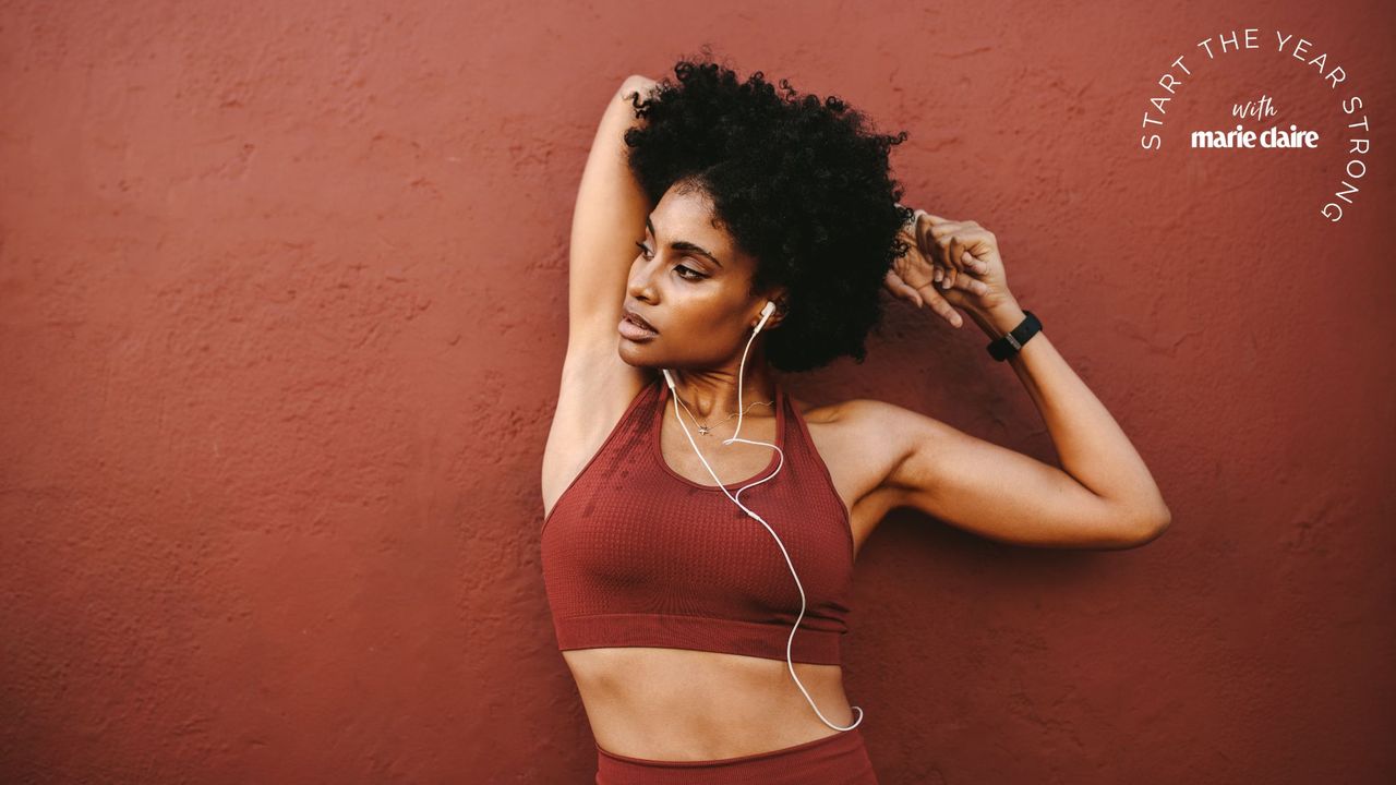 Tricep workouts: A woman stretching her arms after a workout