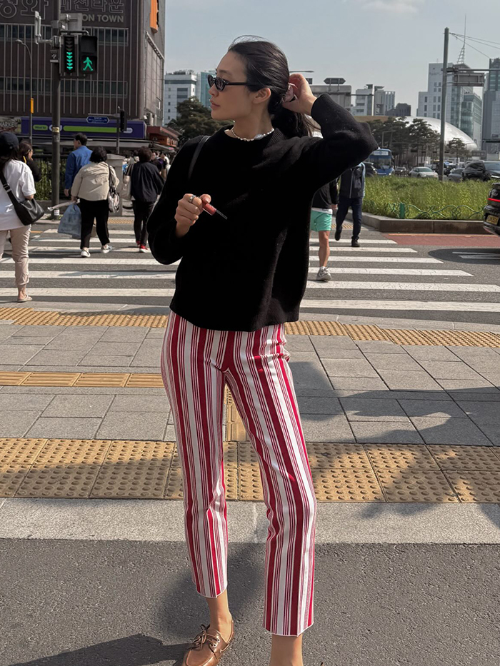 Woman wearing a High Sport pants outfit.
