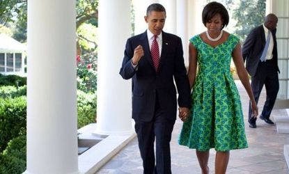 Michelle Obama wears a Barbara TFank dress in September. A First Lady appearance can be worth, on average, $14 million for a clothing company.