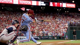 Trea Turner #7 of the Philadelphia Phillies hits a home run in the fifth inning against the Atlanta Braves during Game Four of the Division Series at Citizens Bank Park on October 12, 2023 in Philadelphia, Pennsylvania.