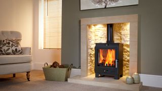 modern wood burning stove in fireplace with lighting