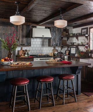 A moody log cabin kitchen