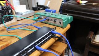 Line 6 DL4 plugged into a patch bay