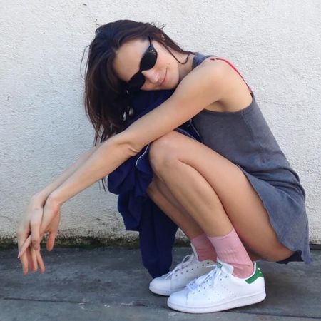 a woman wearing pink socks