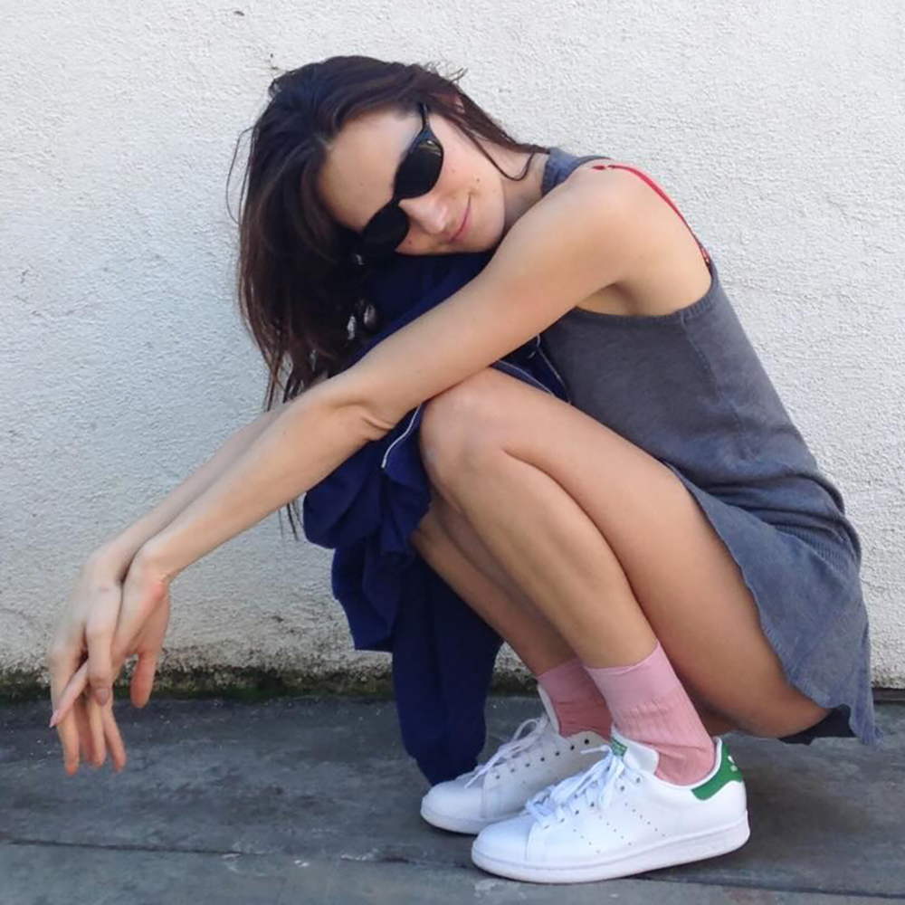 a woman wearing pink socks