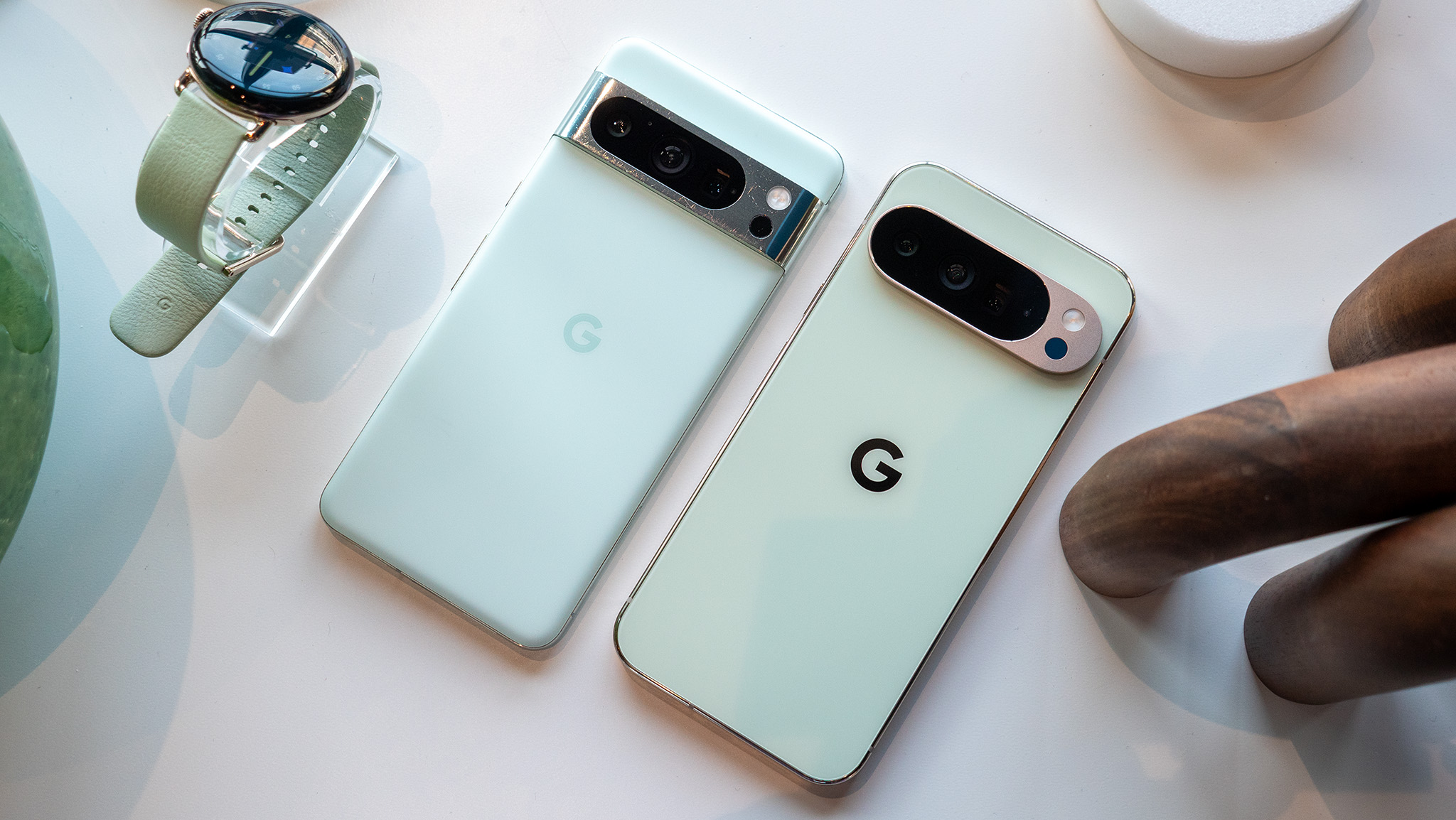 Comparing the mint Google Pixel 8 Pro's design to the jade Google Pixel 10 Pro XL's design