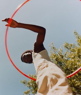 Image from Tyler Mitchell's latest publication, I Can Make You Feel Good - little girl with hoola hoop