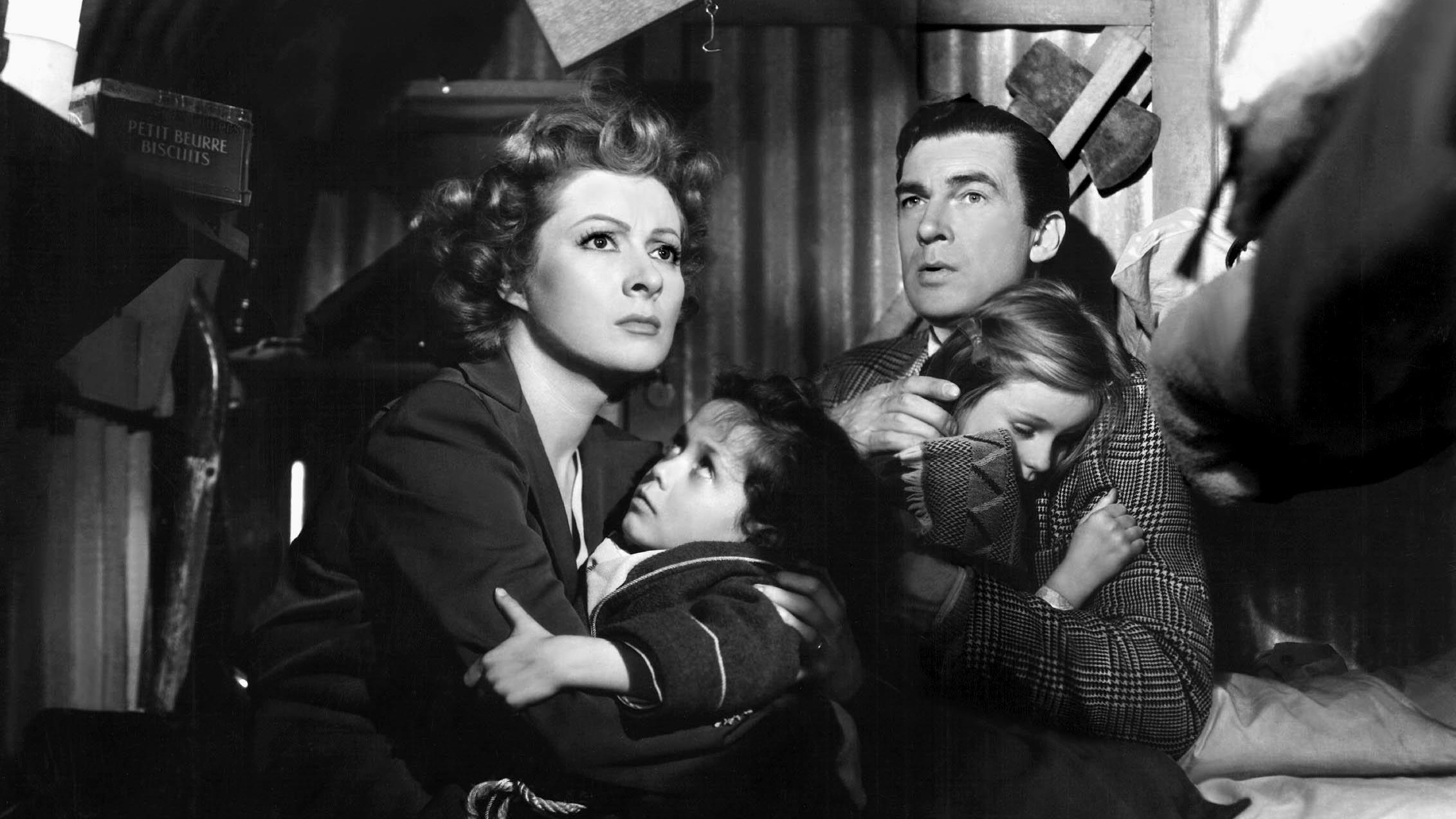 Greer Garson, Christopher Severn, Clare Sanders and Walter Pidgeon in Mrs. Miniver