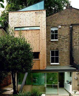 timber clad tower extension to terrace house