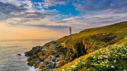 One of the best UK lighthouses, Trevose Head Lighthouse, pictured at sunset