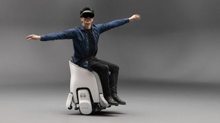 A man wearing a VR headset inside the Honda Uni-One XR Mobility Experience