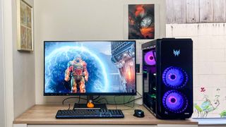 Acer Predator Orion 7000 (2023) review unit on a desk playing Doom Eternal